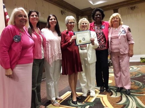Picture of board members being presented the club's charter by the Democratic Women's Club of Florida